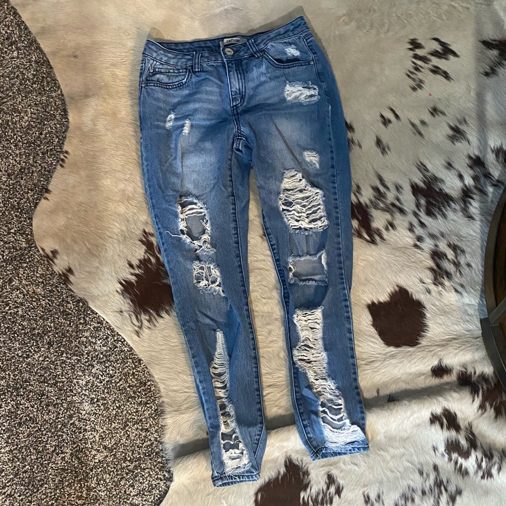 Distressed holey jeans